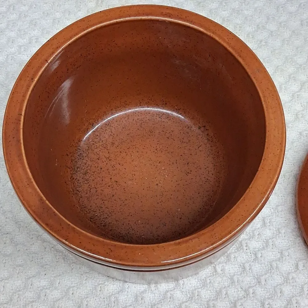 Vintage pottery crock bowl with lid with brown speckled glaze finish.